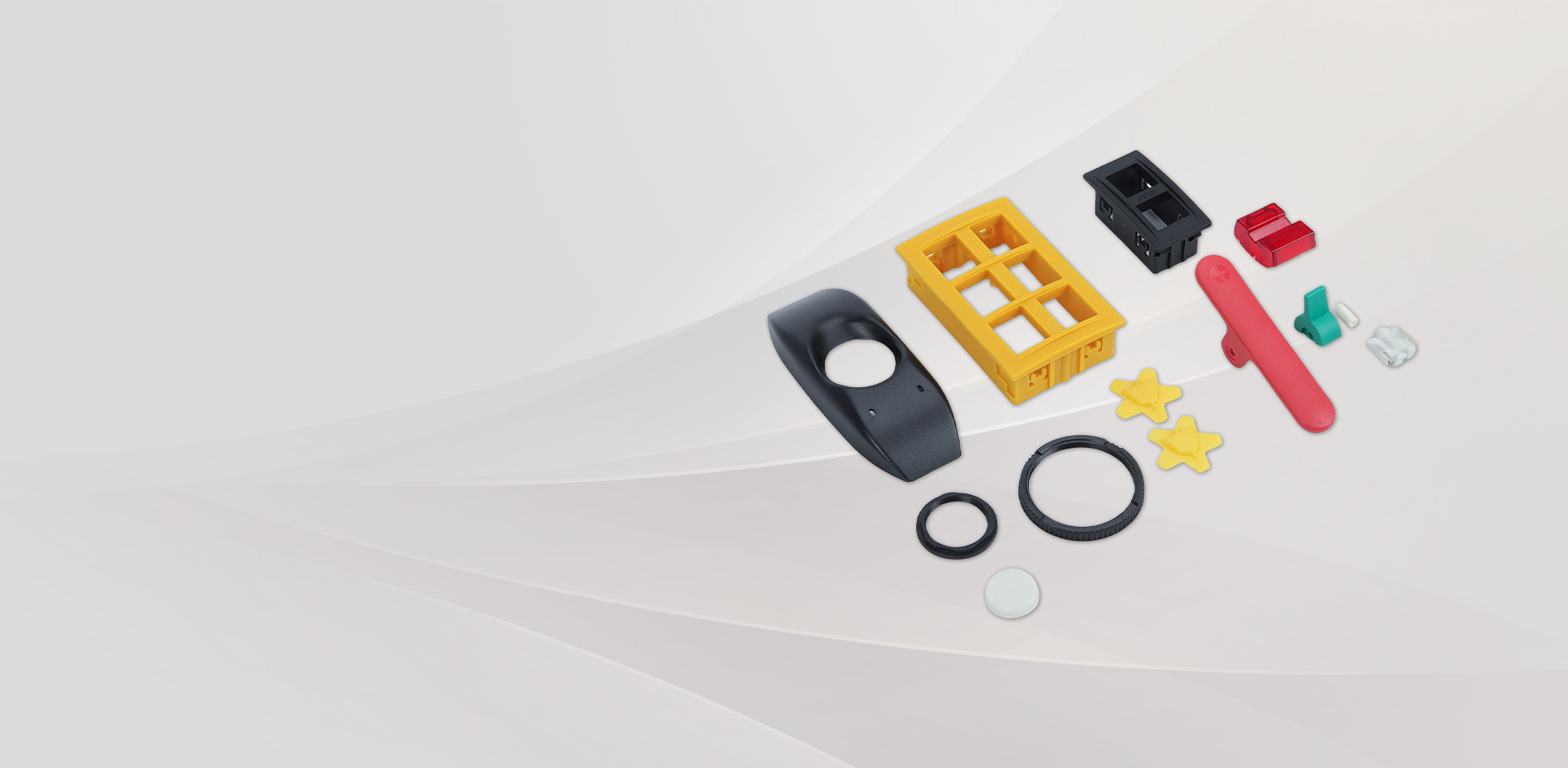 Injection molded products in various colors and shapes.